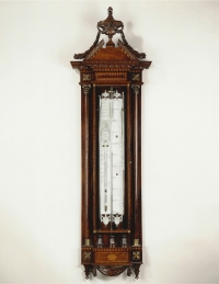 A Dutch mahogany Louis XVI cistern barometer